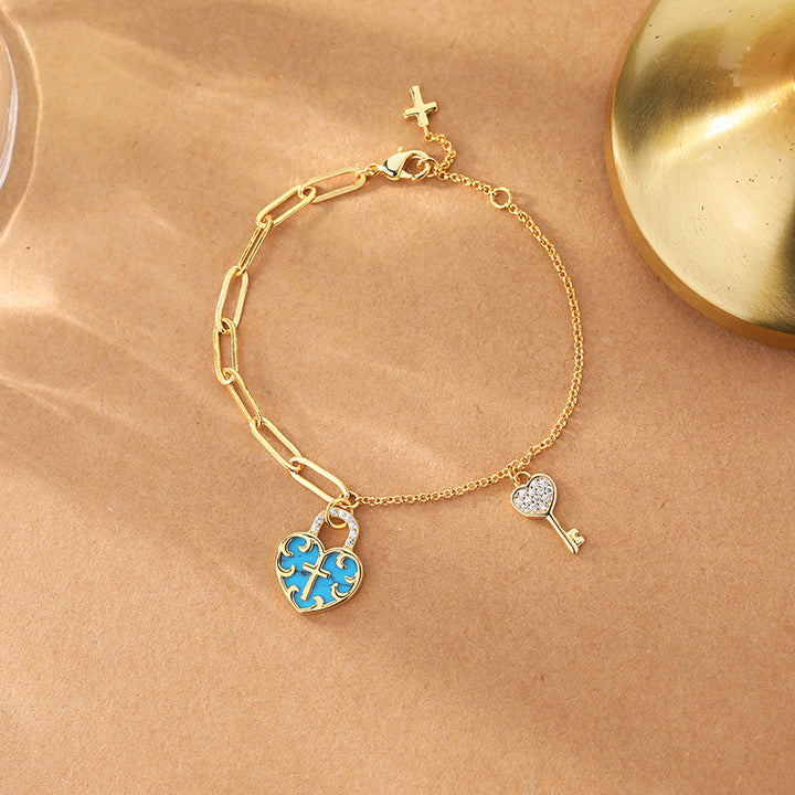 Christianartworkshop Turquoise Cross Heart-Lock Bracelet with Zirconia Key - Cross Heart-Lock Bracelet - image 1