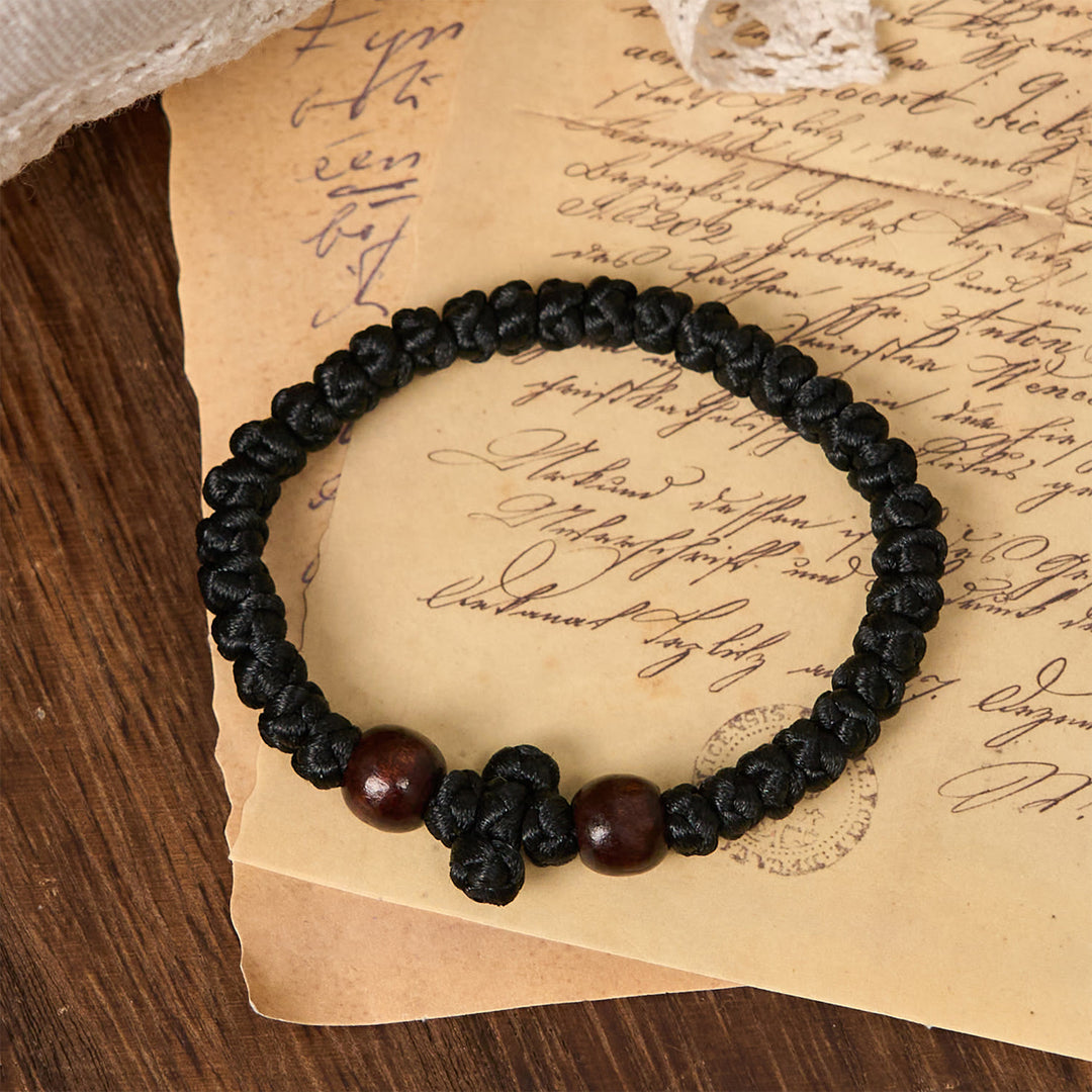 Christianartworkshop Blue & Black Cross - Knot String Bracelet: A Token of Faith - image 1