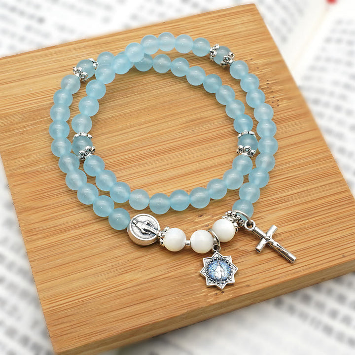 Christianartworkshop 6mm Light Blue Bead Miraculous Medal & Crucifix Minimalist Bracelet: A Symbol of Faith - Crucifix & Miraculous Medal - image 0