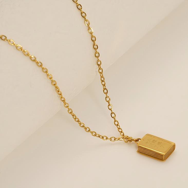 Christianartworkshop Bible Pendant Necklace with Cross Motif: Elevate Your Style with Spiritual Meaning - image 1