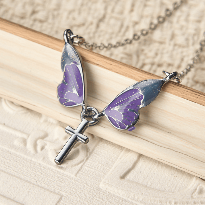 Christianartworkshop Whimsical Butterfly Wing Cross Pendant Necklace: A Dazzling Symbol of Divine Light and Hope - Butterfly & Cross - image 0
