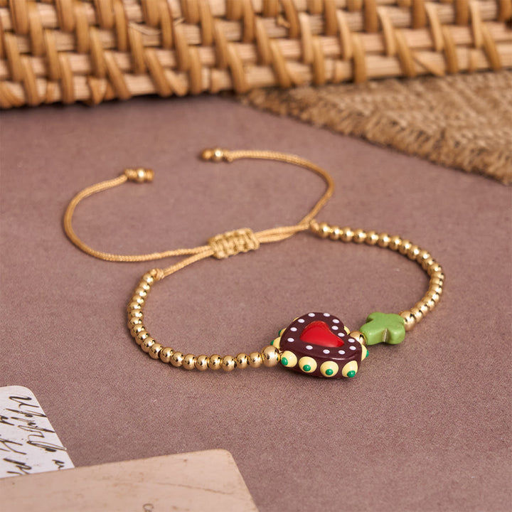 Christianartworkshop Cartoon Style Hand-Decorated Sacred Heart & Tiny Cross Accent Gold Bead Adjustable Cord Bracelet - image 9