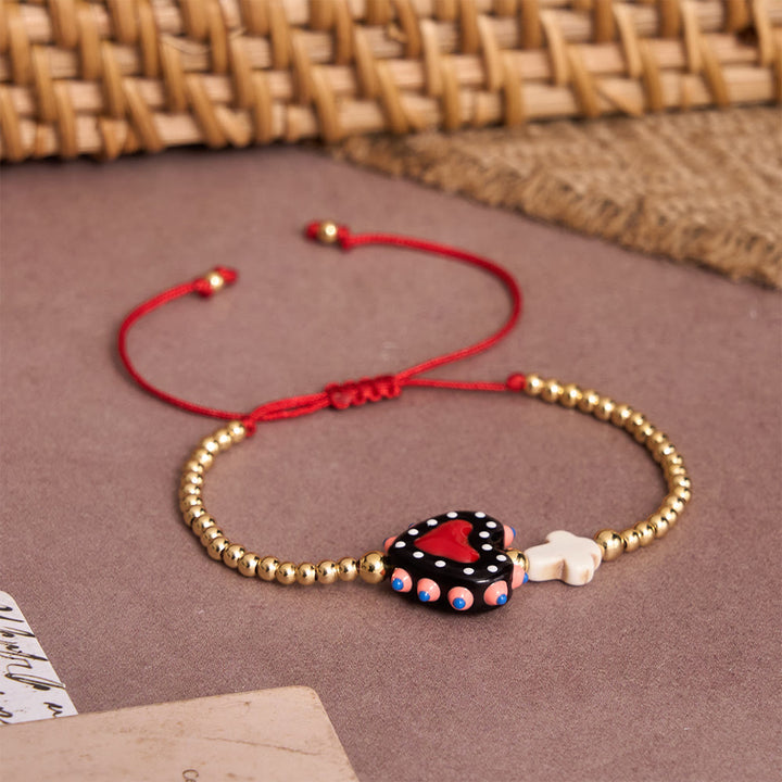 Christianartworkshop Cartoon Style Hand-Decorated Sacred Heart & Tiny Cross Accent Gold Bead Adjustable Cord Bracelet - image 3