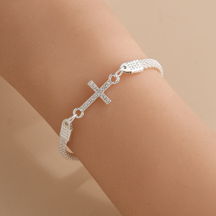 Christianartworkshop Dainty Woven Mesh Band Paved Crystal Sideways Cross Daily Bracelet: A Reminder of Divine Mercy During Quiet Meditation - Silver - image 0
