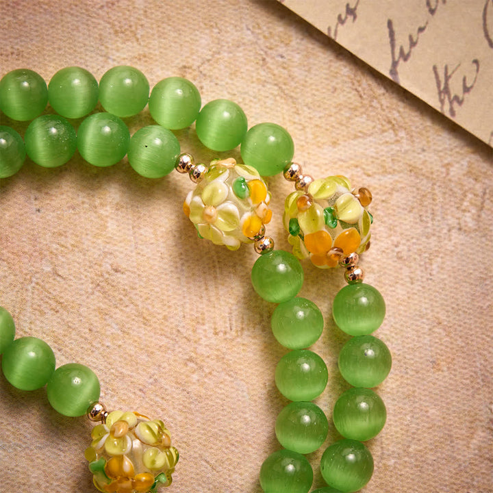 Christianartworkshop Green Cat's Eye Stone Rosary With Floral Lampwork Glass Beads: Emblem of Vibrant Heavenly Blessings - image 5